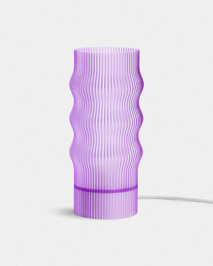 Purple textured lamp on a white background